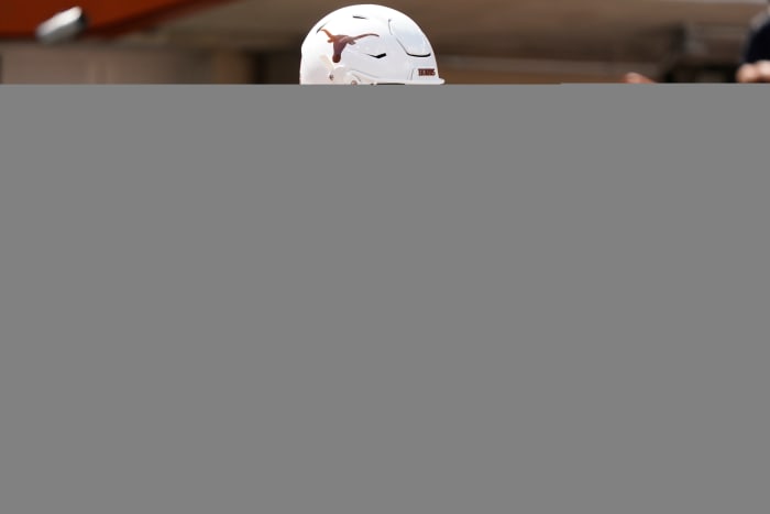 Texas Longhorns quarterback Arch Manning (16) warms up before the game against the Kansas Jayhawks at Darrell K Royal-Texas Memorial Stadium.